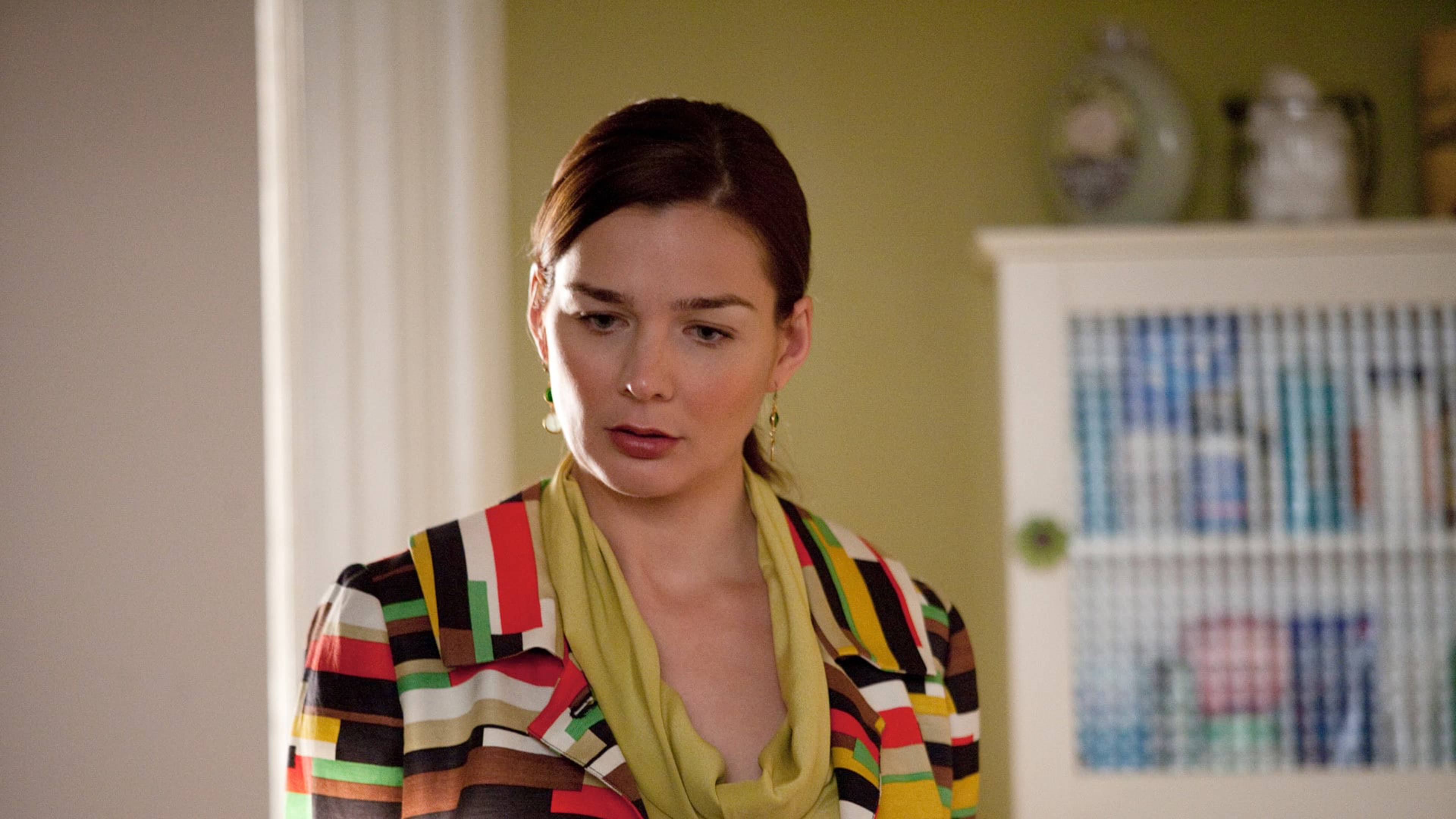 Two Large Pearls And A Gold Bar