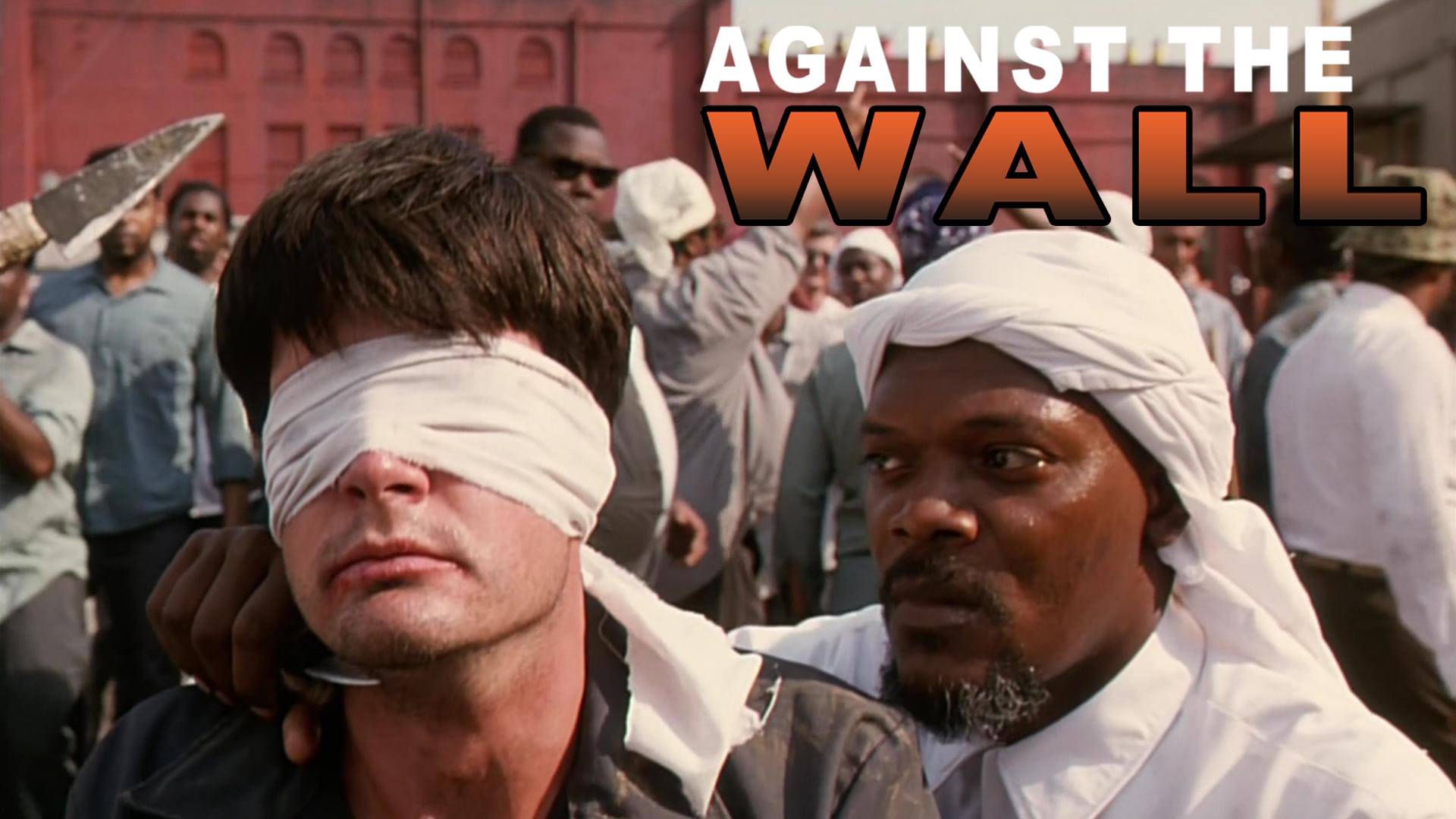 Is against the wall. Is against the wall